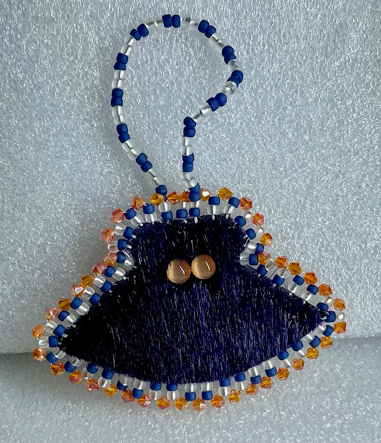 ulu ornament furred iceseal and salmon leather decoration